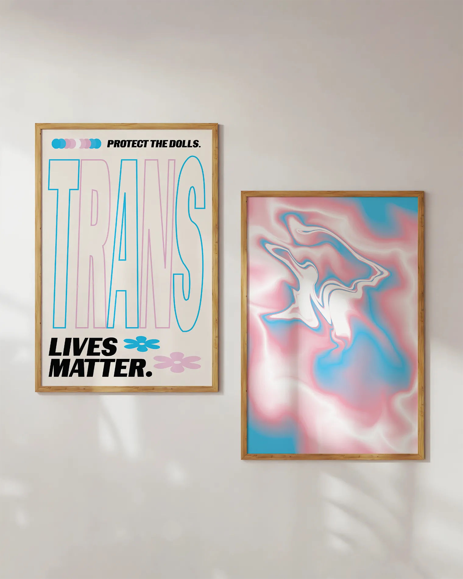 A print with the text 'Trans Lives Matter', with the transgender pride flag colours.