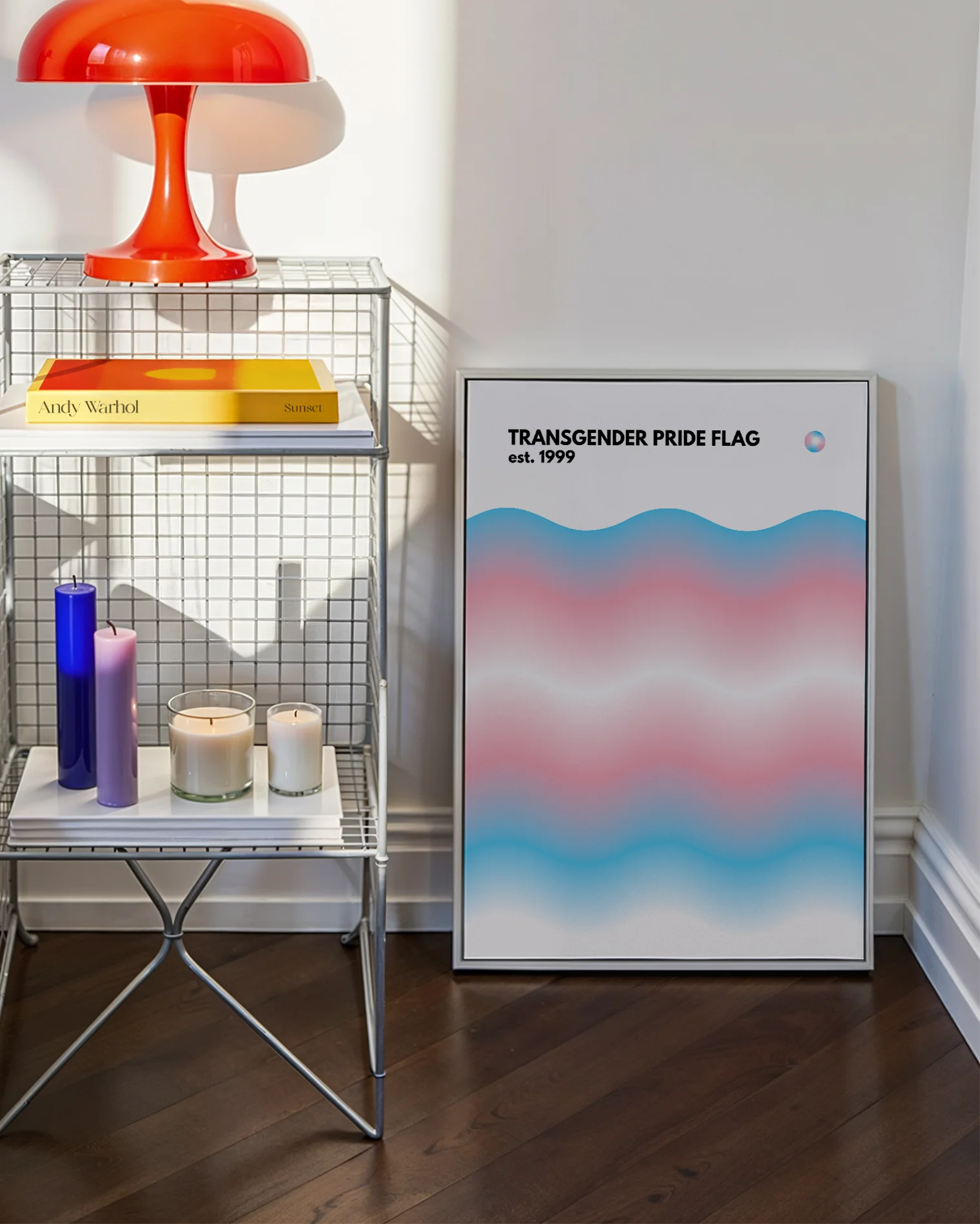 A print with the Transgender pride flag in a wavy, abstract form together with the text 'Transgender Pride Flag est. 1999.'