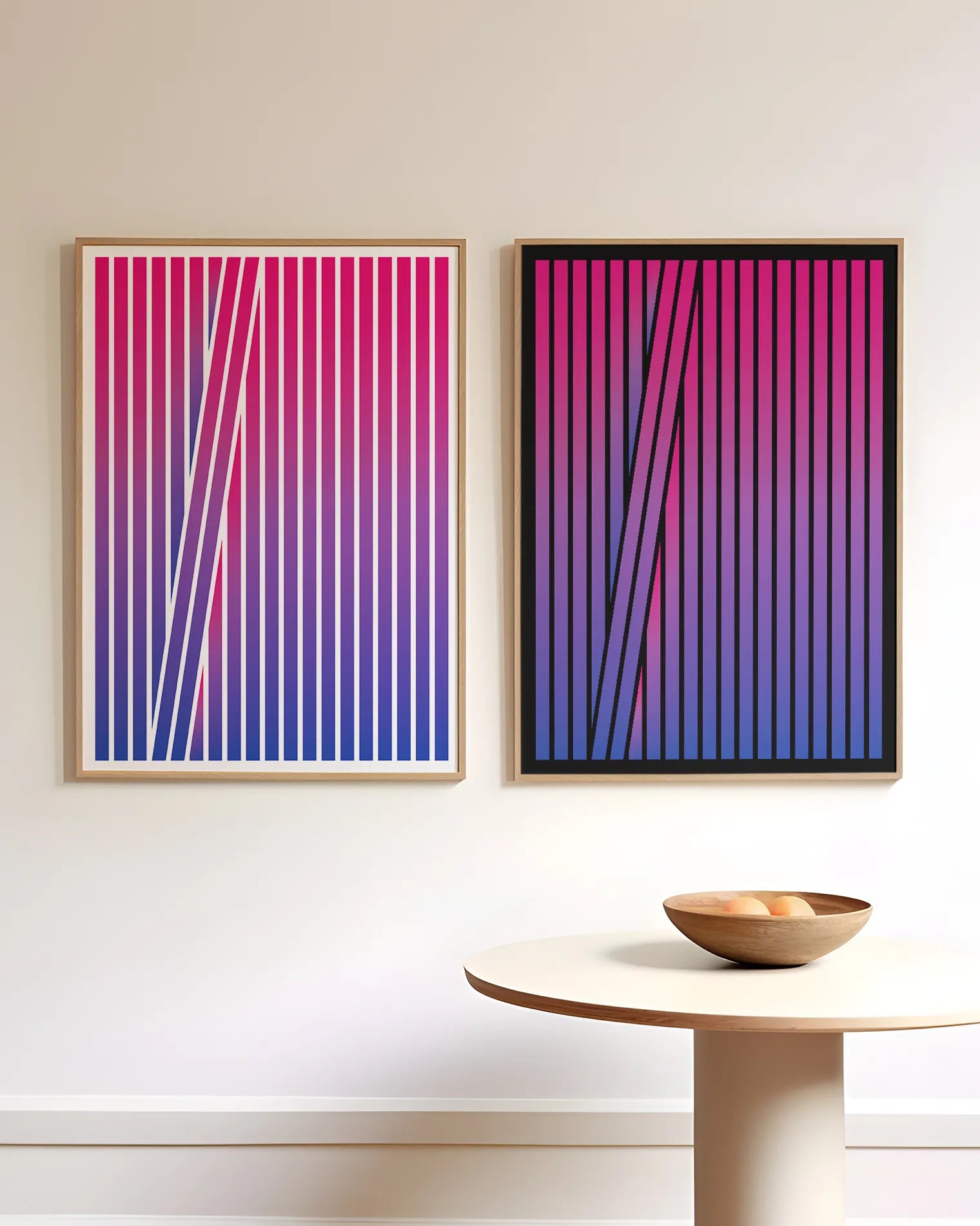 Two framed posters with an abstract bisexual flag formed in stripes.