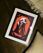 A poster with a lesbian vampire couple.