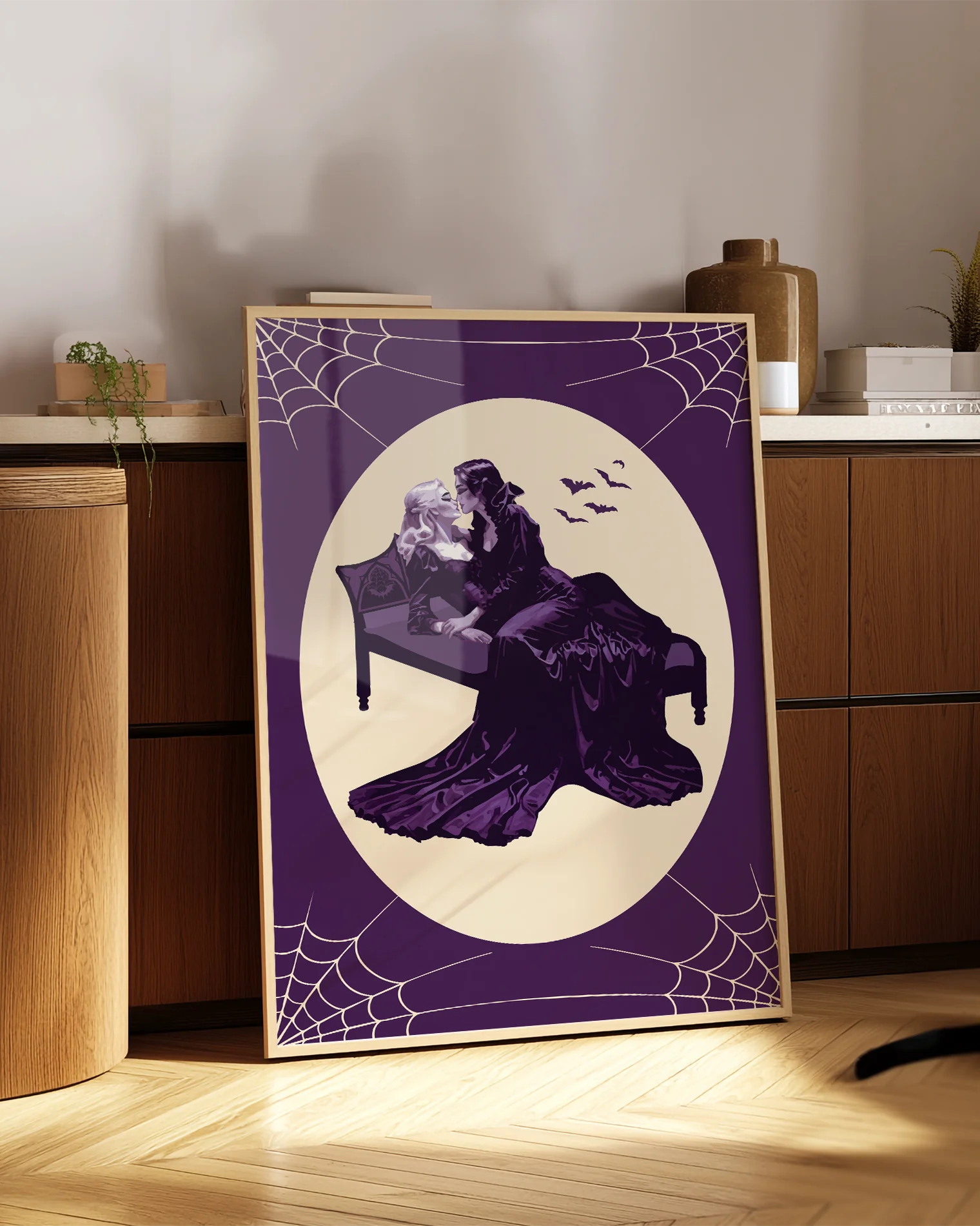 A poster with a lesbian vampire couple kissing in a bed.