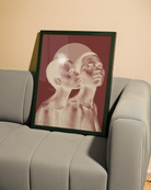 The poster depicts two naked, black women in a romantic pose in a negative color scale.