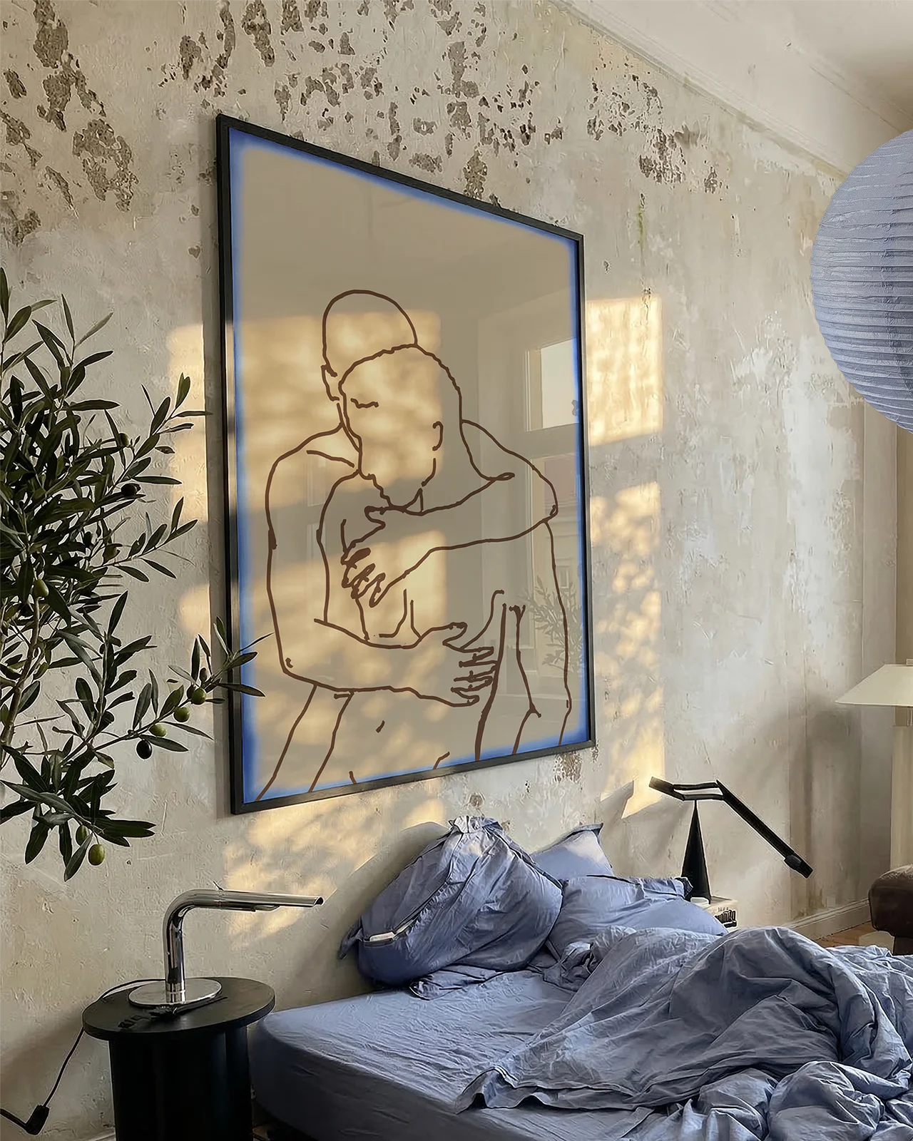 A poster with two naked men hugging each other in a lineart style.