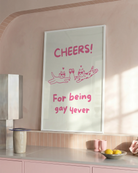 A poster with two cats cheering, with the text 'CHEERS! For being gay 4ever'.