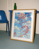 A framed poster with two men smoking cigarettes in a red line-art style, against a blue sky.