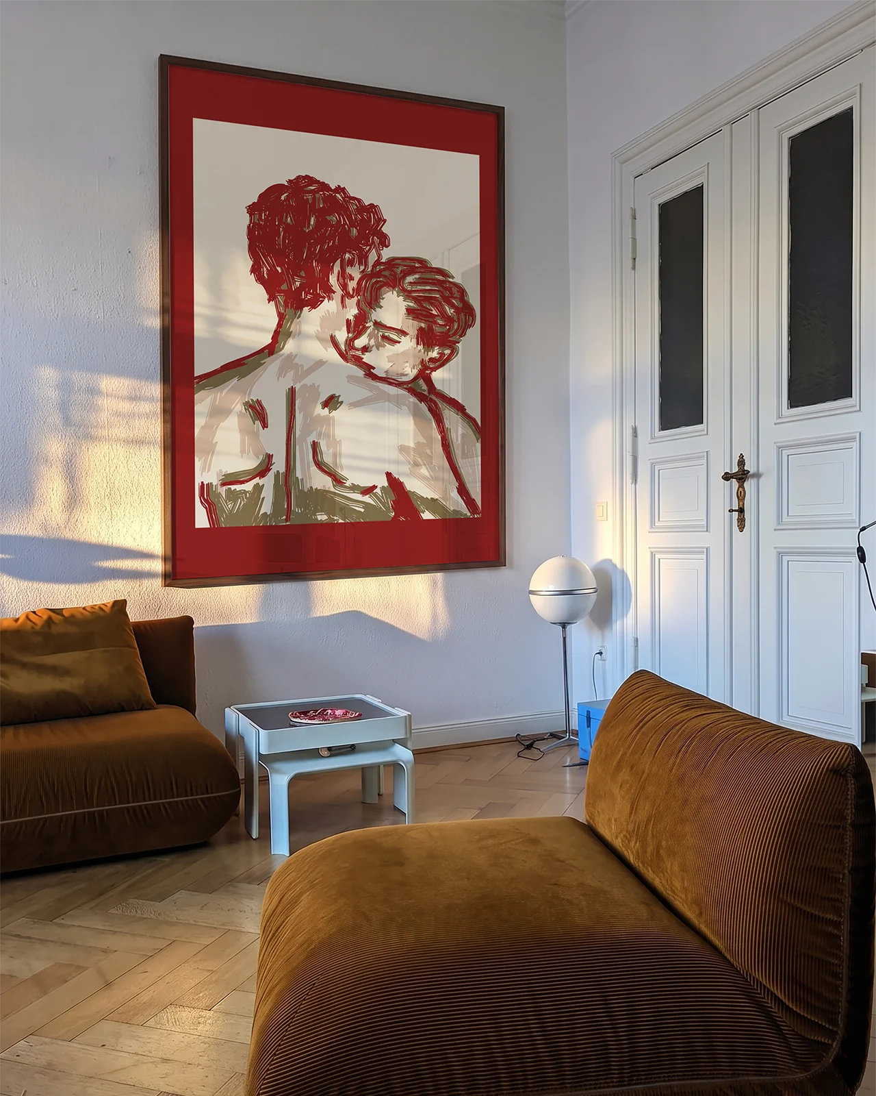 A poster of two illustrated gay men hugging in an abstract style.