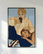 A poster of a lesbian couple cuddling.