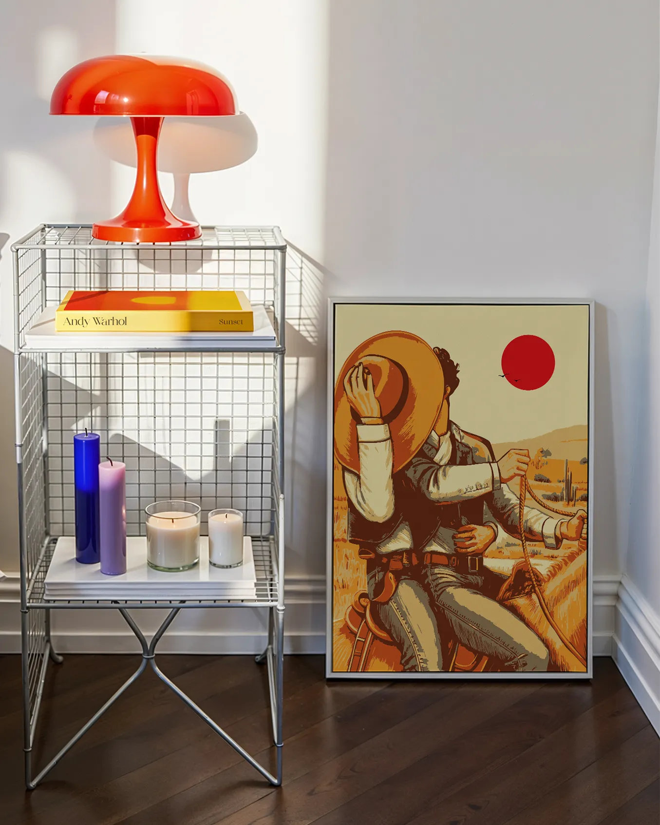 A poster with two illustrated cowboys sitting on a horse, kissing behind a cowboy hat, sunset in he background.