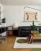 A framed poster with two gay cowboys.