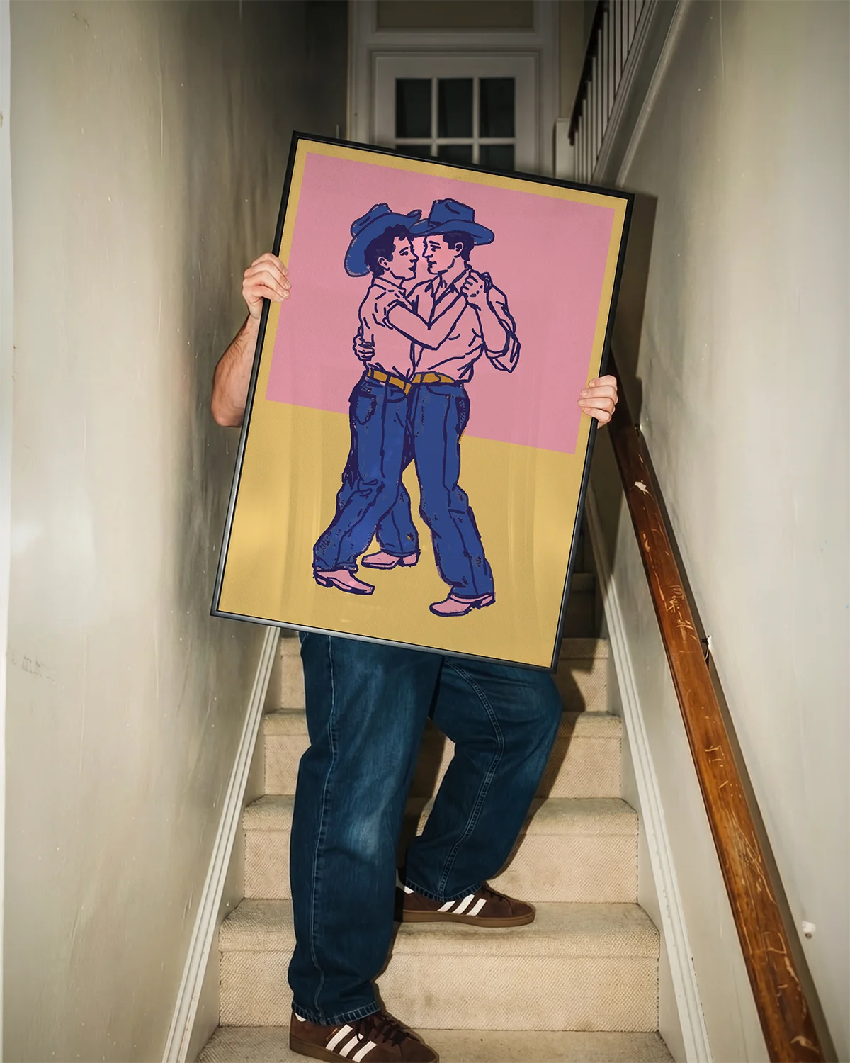 A poster with two dancing gay cowboys.