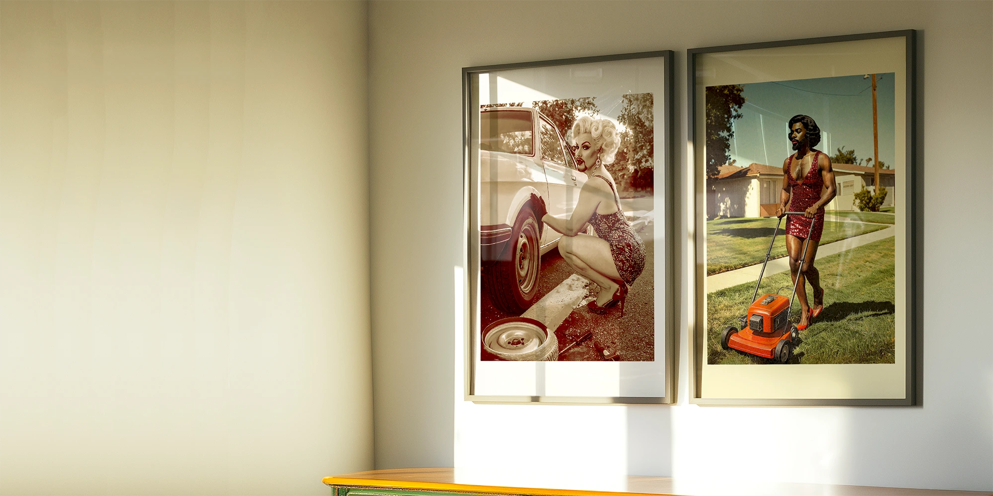 Two framed, funny queer dragqueen posters.