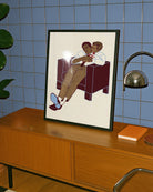 A framed poster with two gay men hugging.