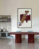 A framed poster with two gay men hugging.