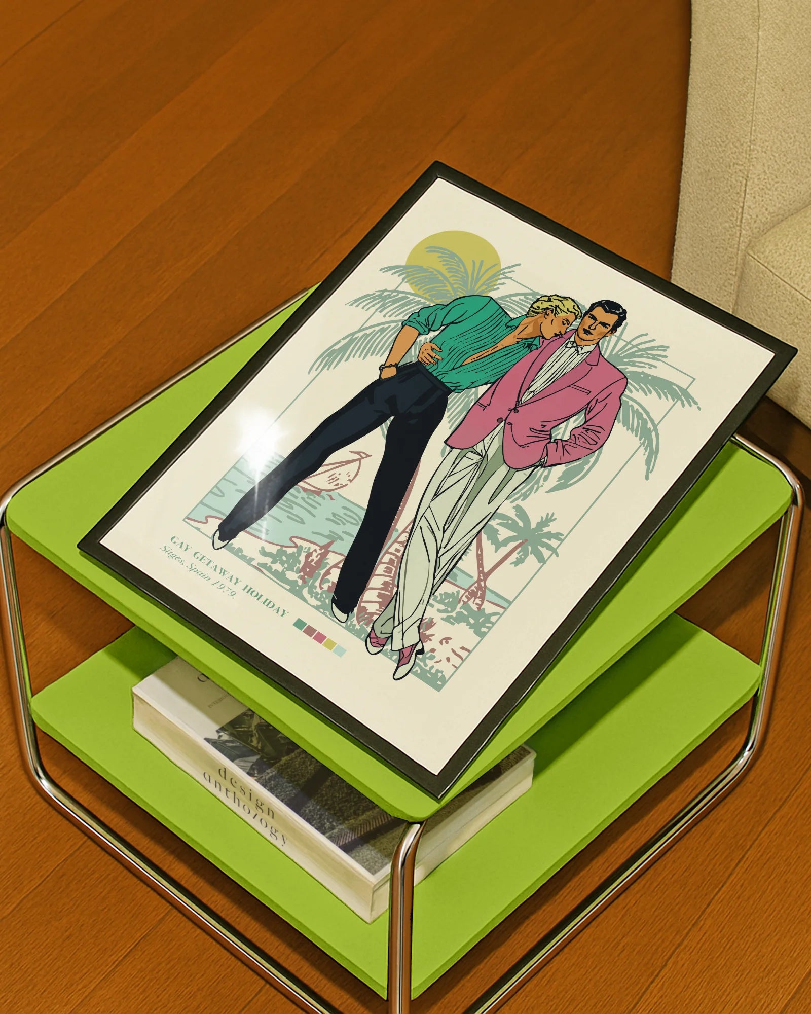 A poster depicting two gay men in a romantic embrace on a warm beach, featuring the text: “GAY GETAWAY HOLIDAY” & “Sitges, Spain 1979.”