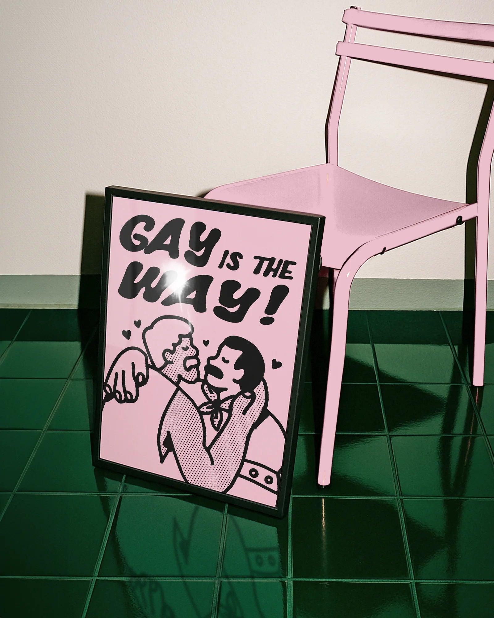 A poster with two gay men kissing with the text 'GAY IS THE WAY!'