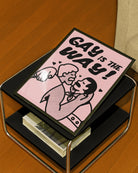 A poster with two gay men kissing with the text 'GAY IS THE WAY!'