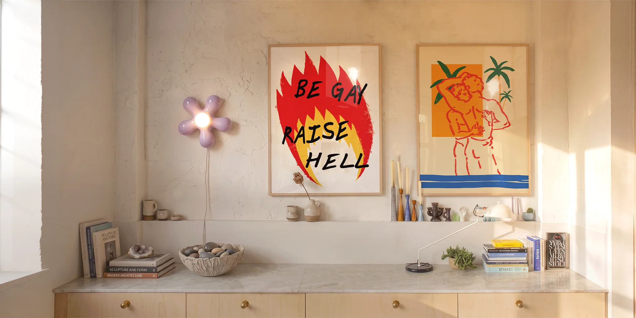 Two gay posters on a wall.