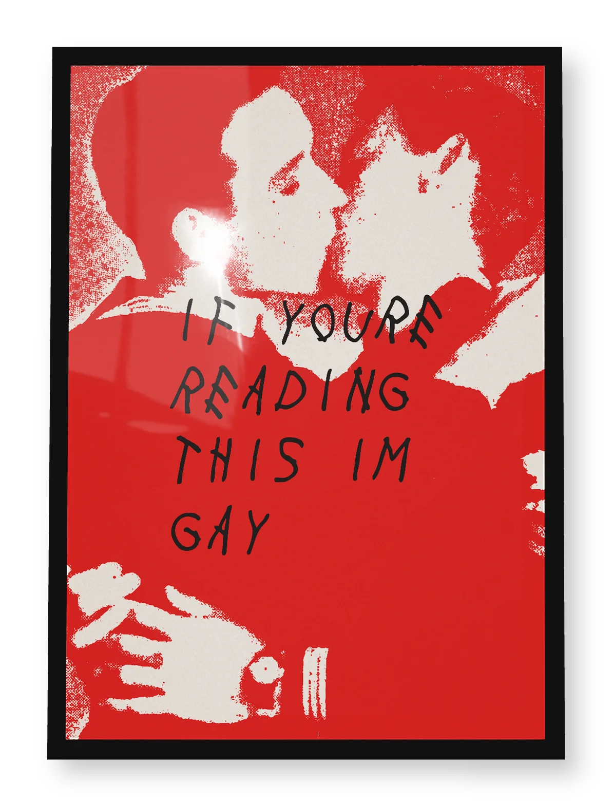 A framed print with the text ´If you're reading this, I'm gay'.