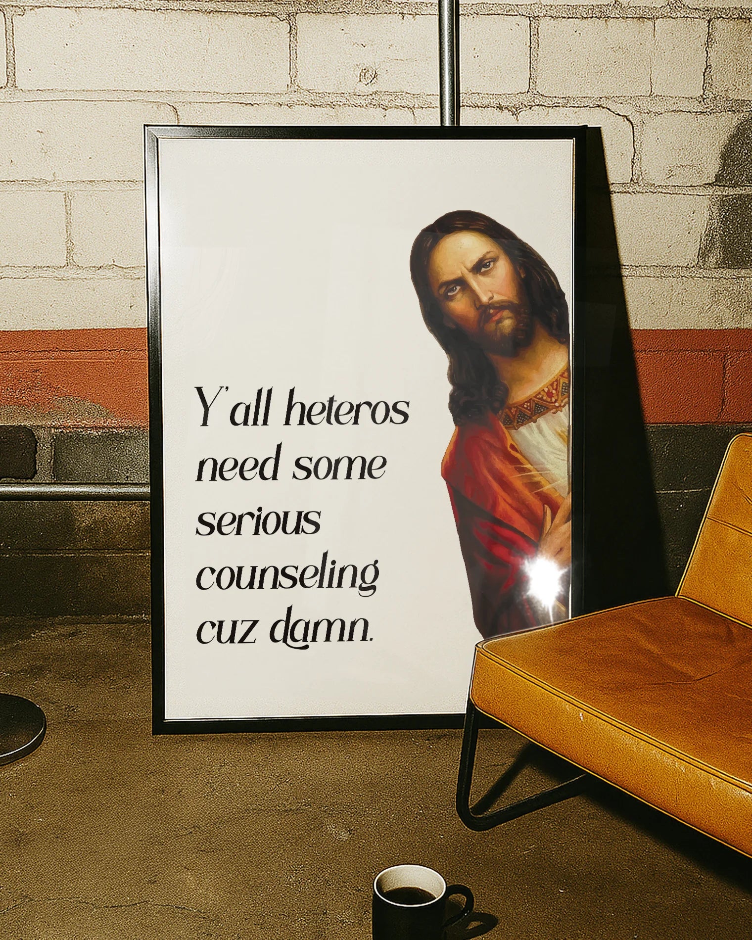 A framed poster with Jesus saying "Y'all heteros need some serious counseling cuz damn."