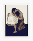 A poster with two men kissing on the floor.