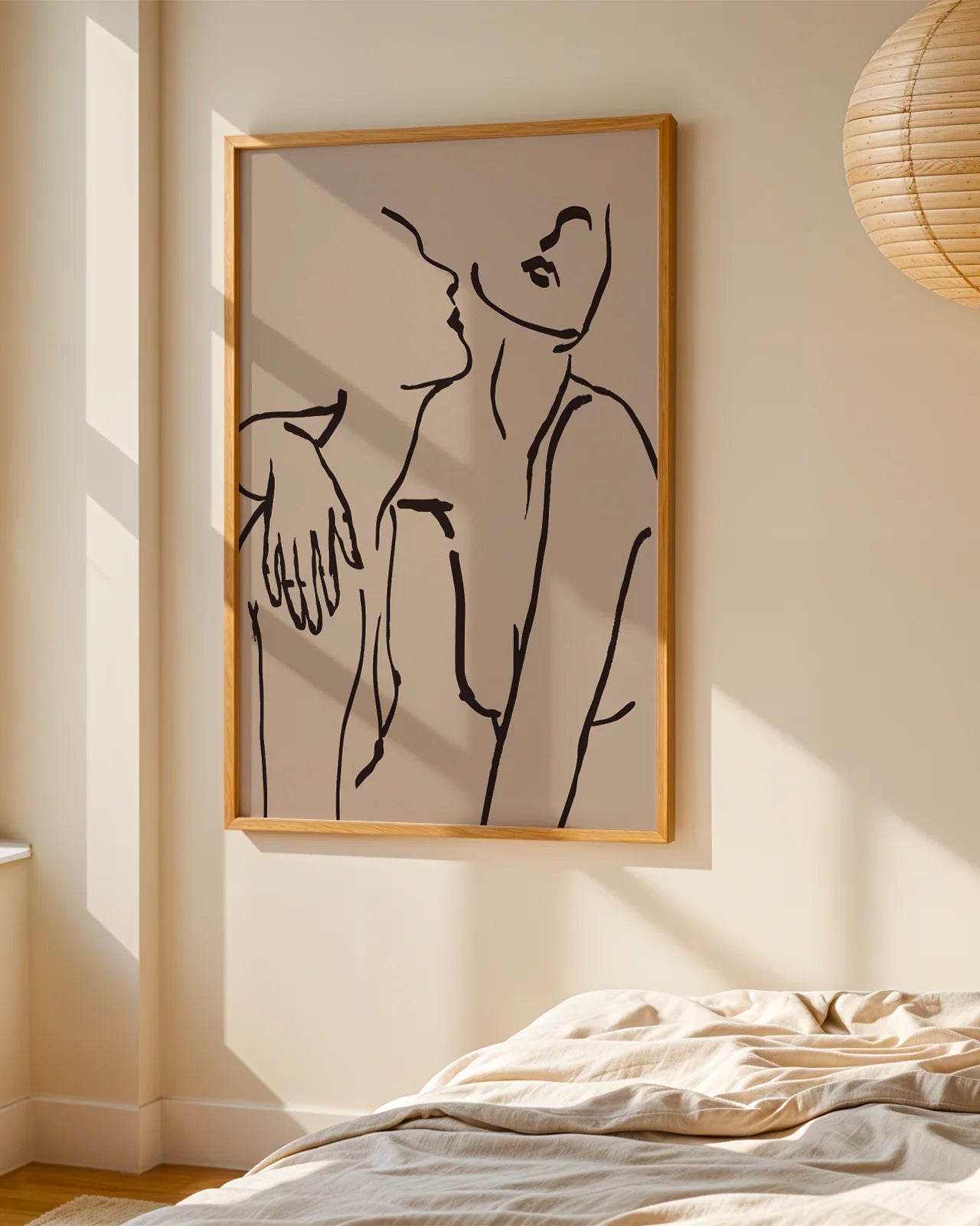 A poster with two naked women hugging, linear style.