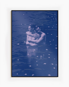 A poster with two gay men hugging each other in a dark blue lake.