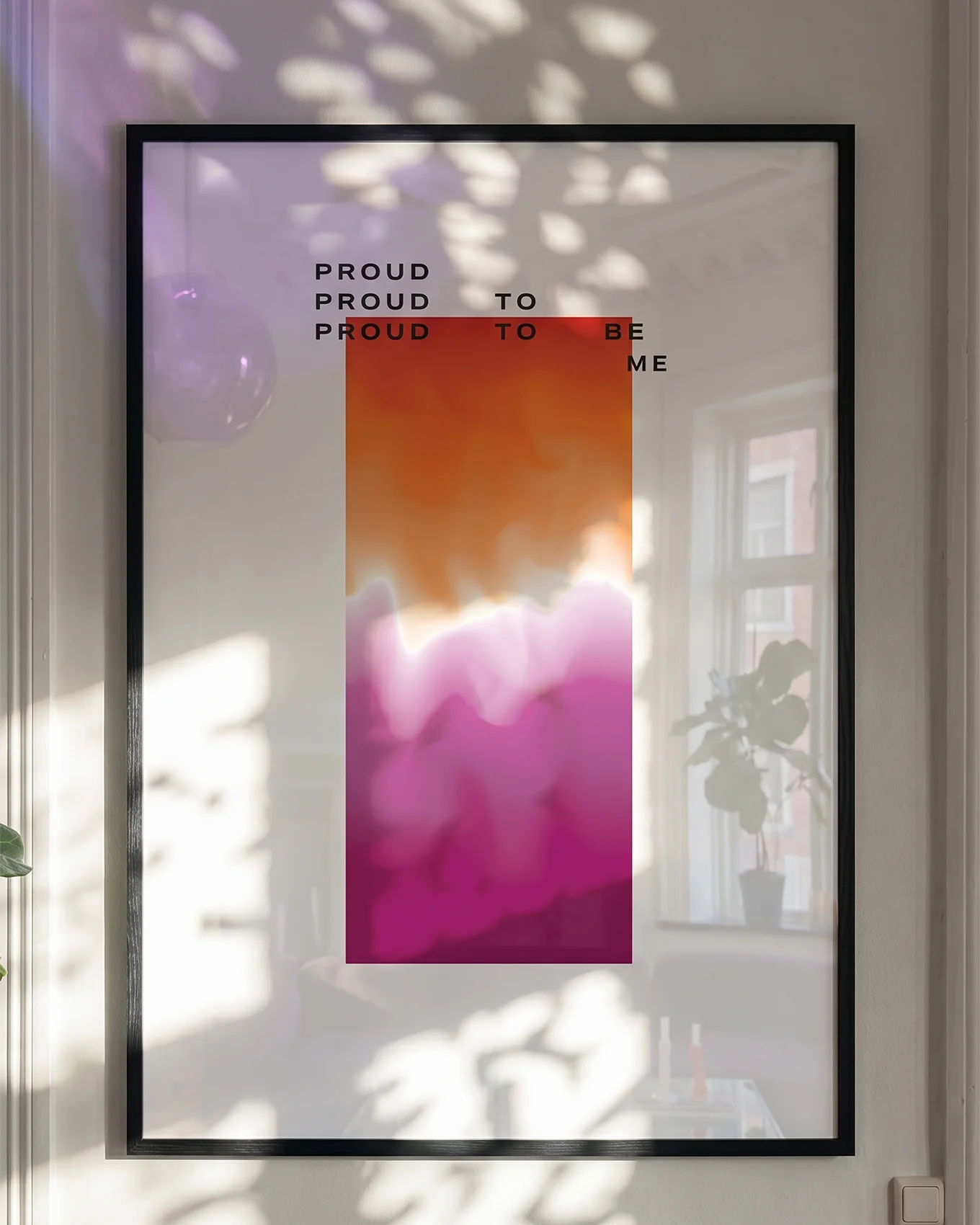 A poster with a gradient lesbian pride flag and the text: 'Proud to be me'.