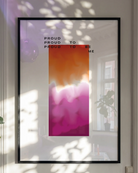 A poster with a gradient lesbian pride flag and the text: 'Proud to be me'.