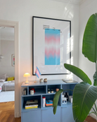 A poster with a gradient transgender pride flag and the text: 'Proud to be me'.