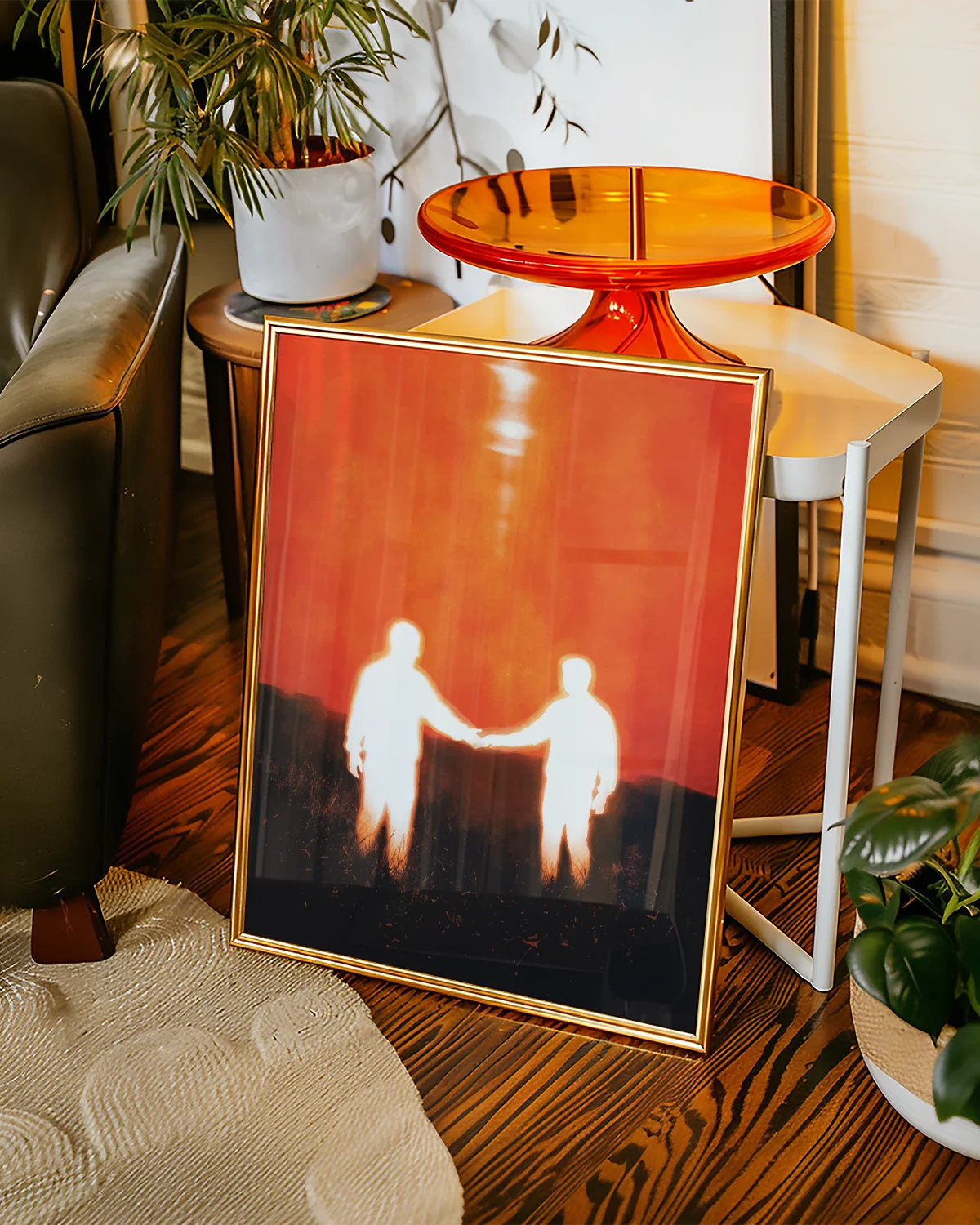 A poster of two men reaching out to each other.