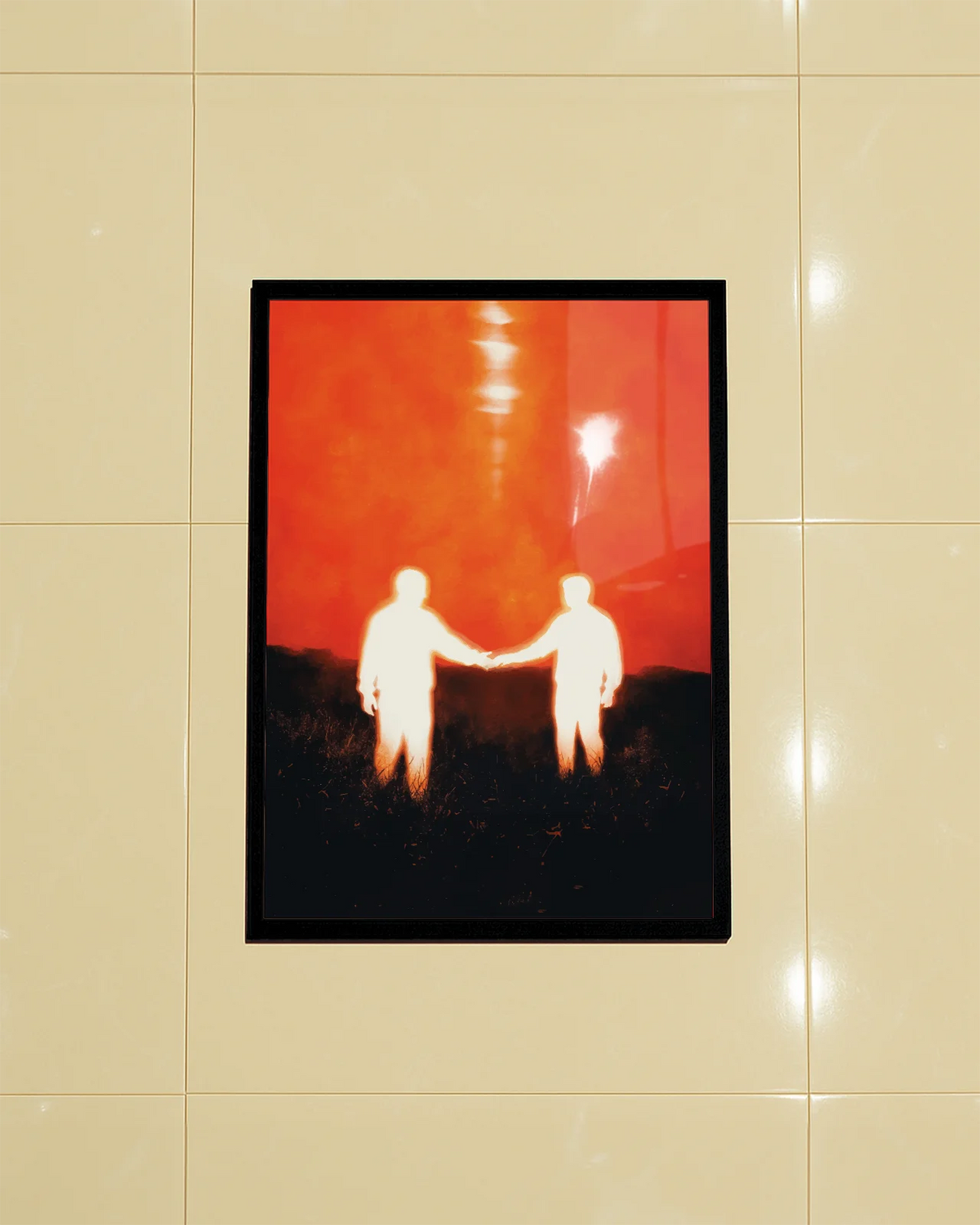 A poster of two men reaching out to each other.