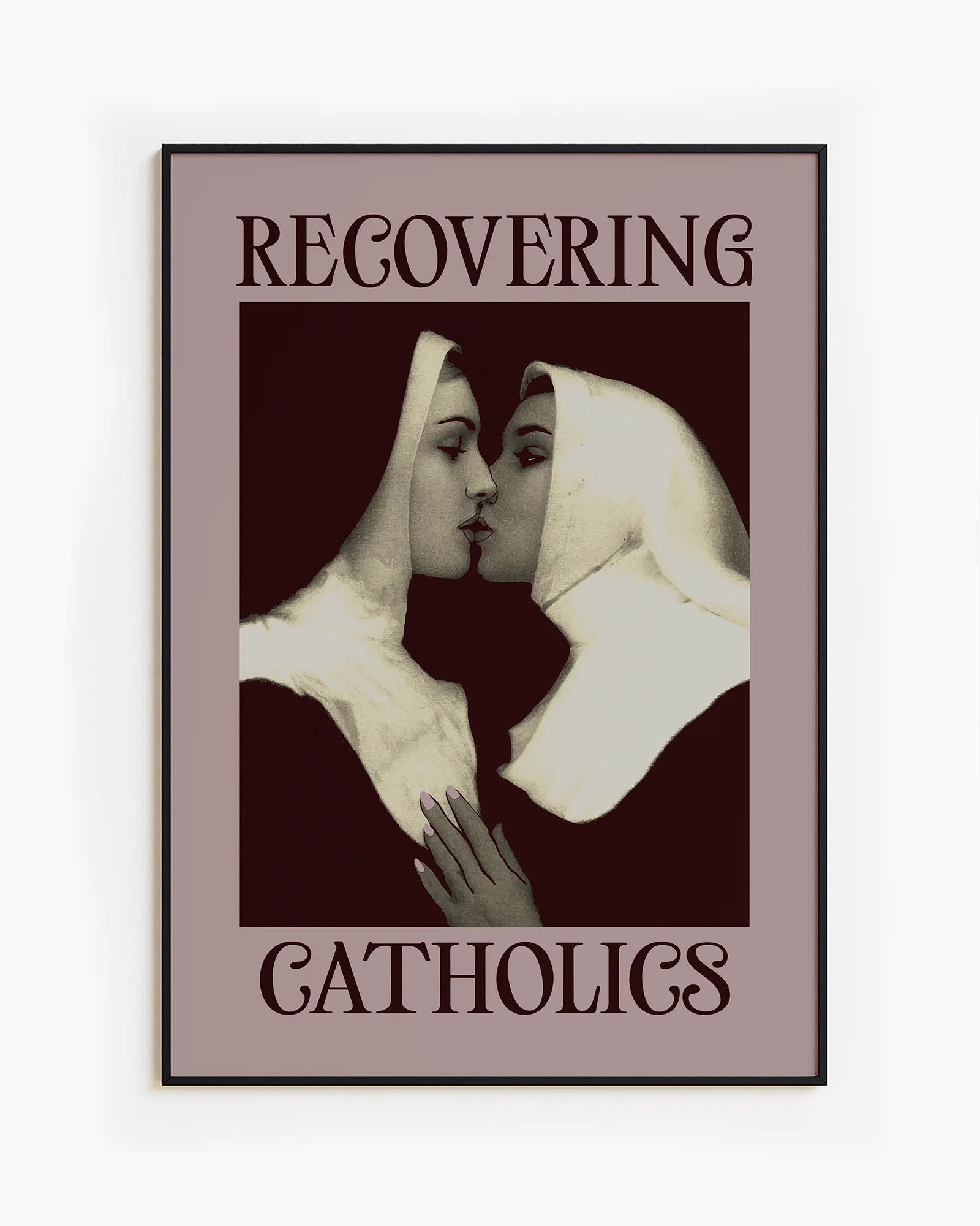 A framed poster featuring two kissing nuns, paired with the text "RECOVERING CATHOLICS."