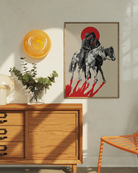 A poster with two riding cowboys, kissing.