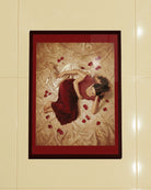 A framed poster with two sapphic ladies in a bed, surrounded by rose pedals.