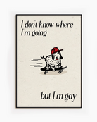 A framed poster with a cute, curly dog on a skateboard with the text 'I don't know where I'm going but I'm gay.