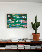 A poster with the text 'I'LL MAKE YOU FEEL SOME TYPE OF GAY', against an abstract landscape.