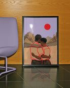 En poster som föreställer två män i en omfamning framför en vacker bergskedja, röd sol och lila himmel.