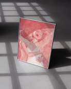 A poster with two ladies hugging, abstract and pink.