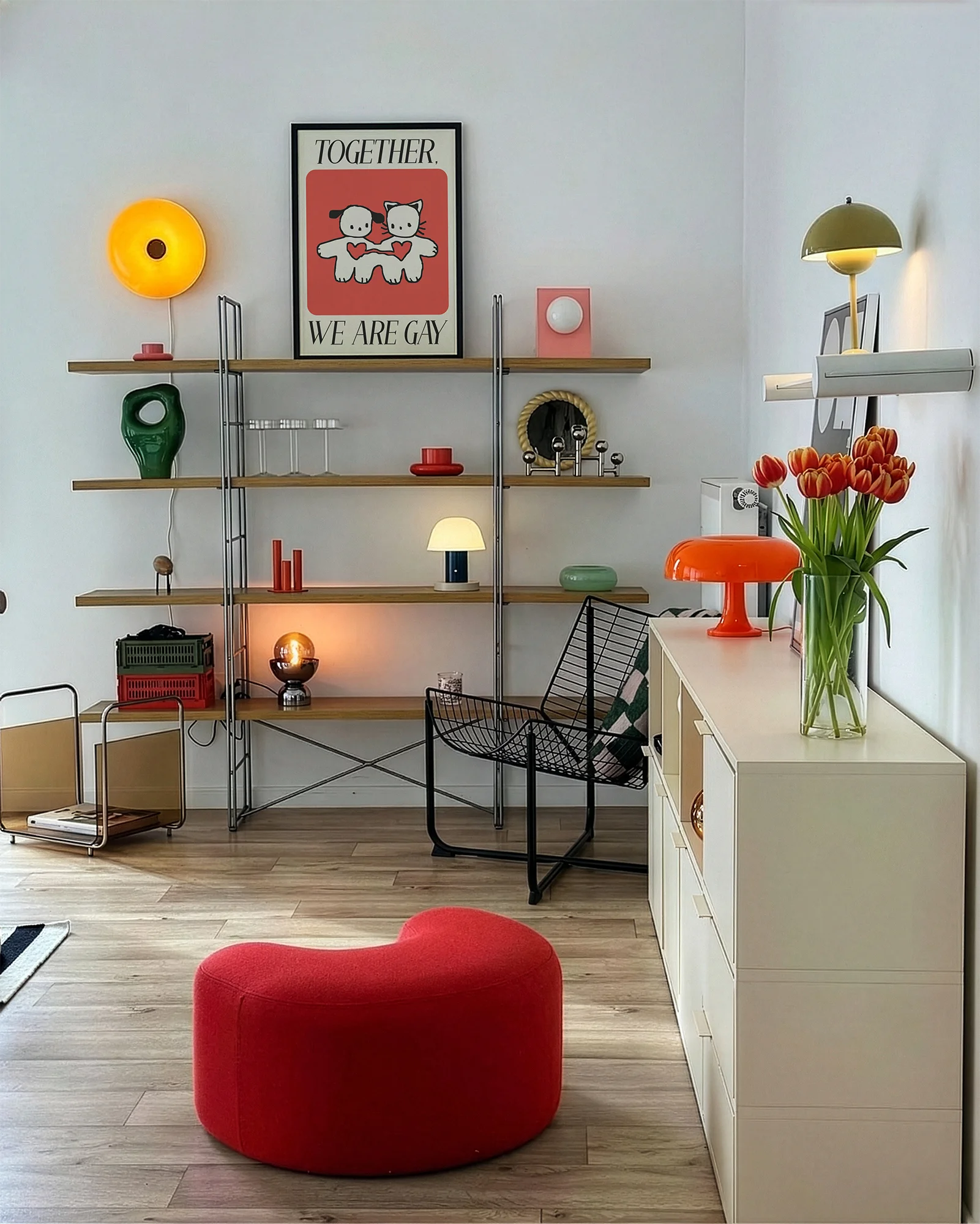 A poster with two cute figures holding hands, with the text 'Together, we are gay'.